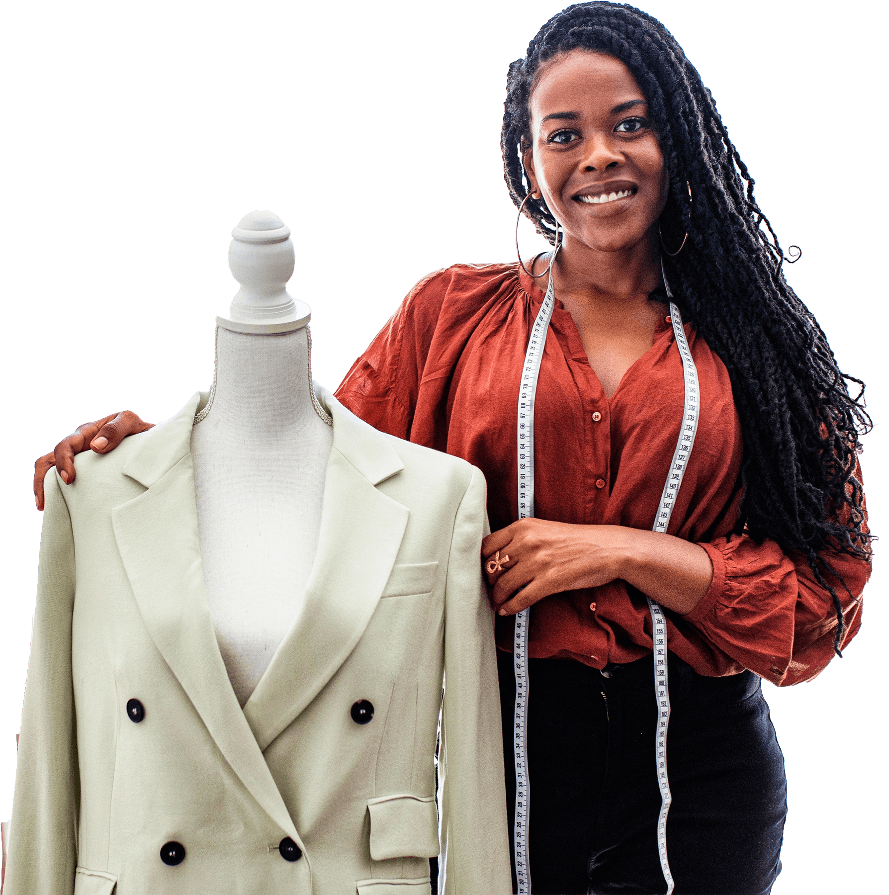 Tailor standing beside a dressed mannequin