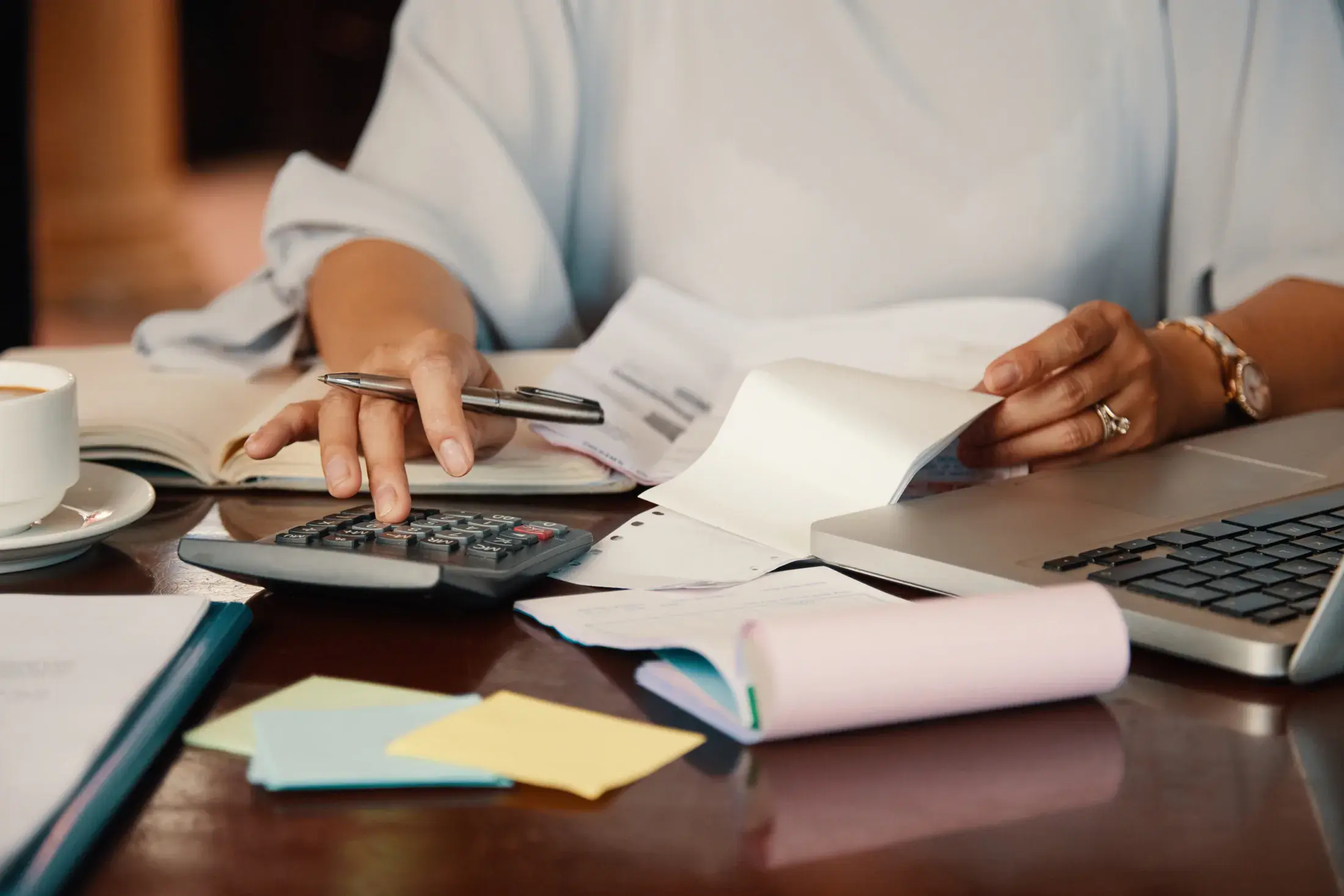 A studio owner reviewing the business behind her craft